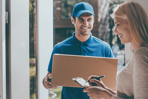 delivery man delivering parcel